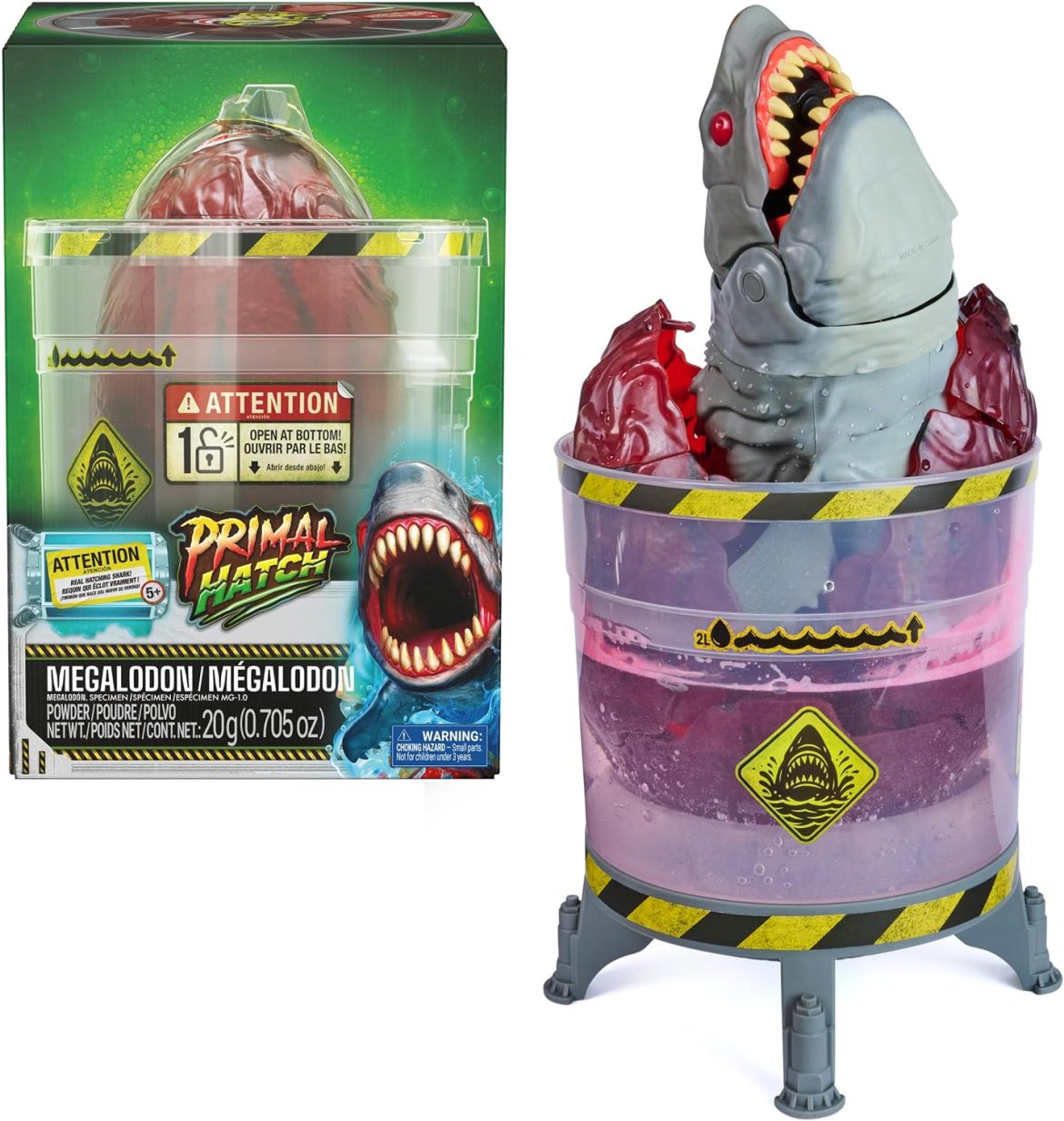 Primal Hatch Megalodon bursting from its egg inside the clear tank during the fizzy reveal