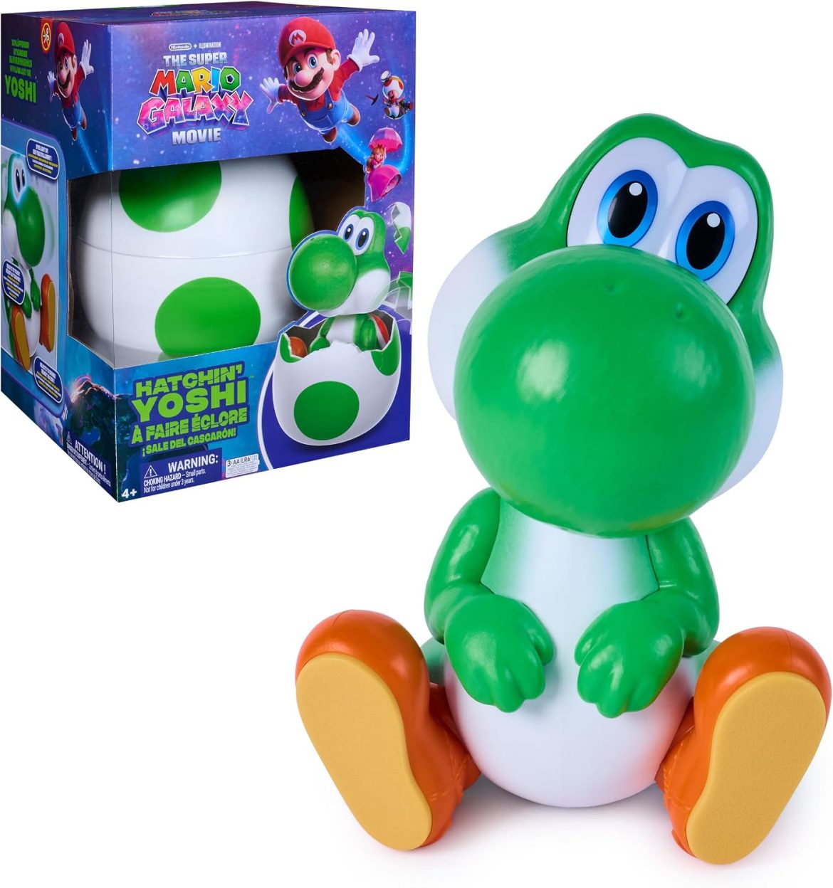 Green Yoshi figure posed beside a cracked Yoshi egg and retail box